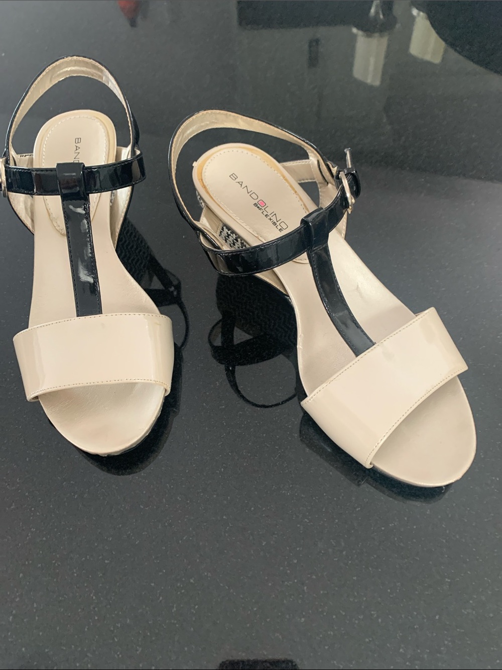 Bandolino Two-Tone T-Strap Sandals in Cream and Black Patent